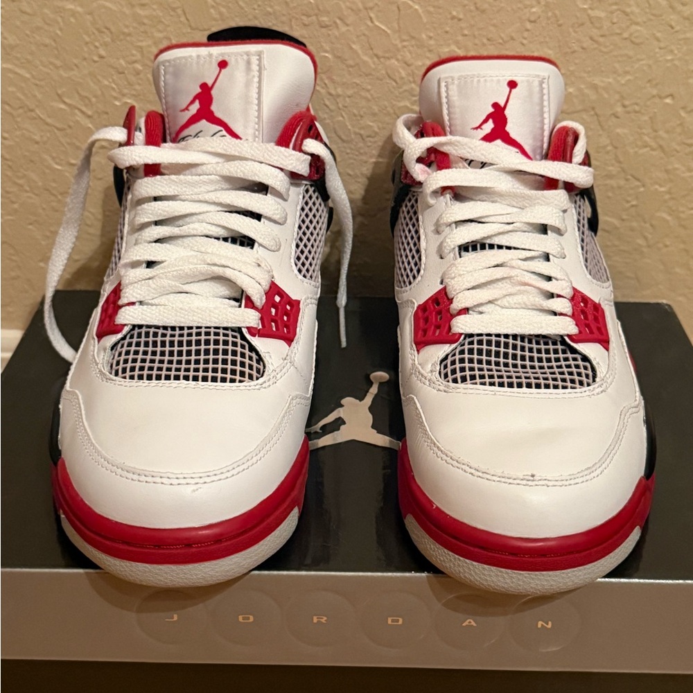 Air Jordan 4 Retro White and Red Athletic Shoes